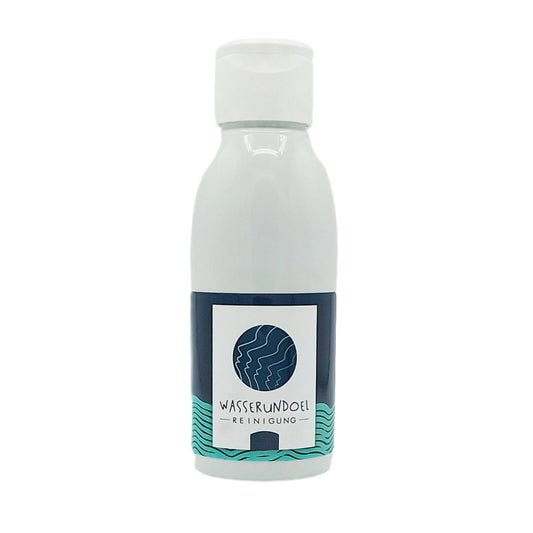 Eine weiße Flasche mit dem Aufkleber von wasserundoel mit der Reinigungsmiclh Melisse